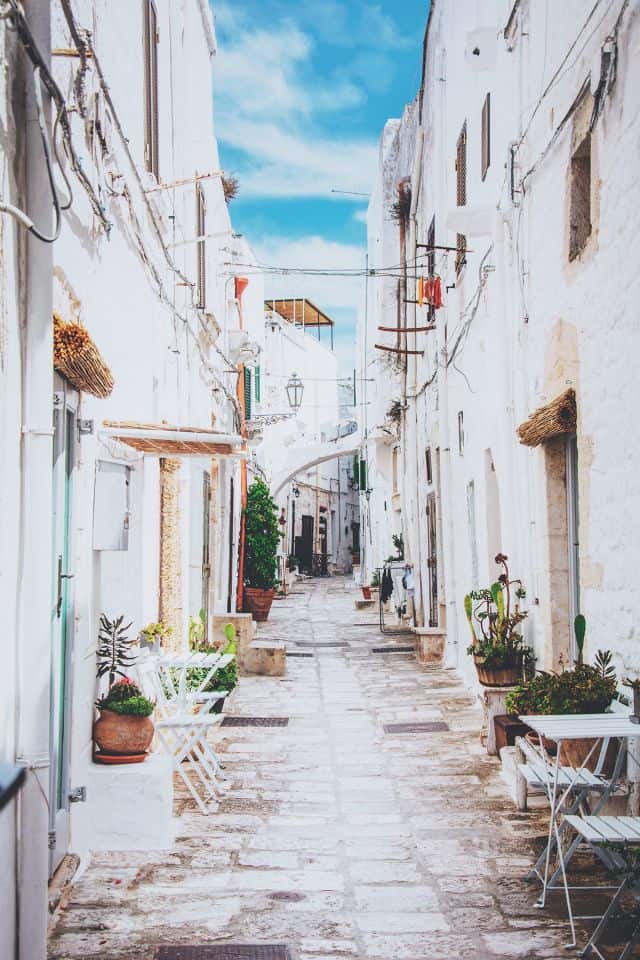 Ostuni, August 2018.
The image was taken last August in the White City. The Apulian village is famous for its streets and stairways adorned with colorful flowers, plants and vases and always full of tourists.  | Carola Ferrero - e-borghi Community