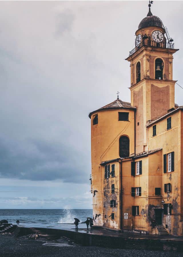 Camogli, March 2018.
Camogli is a renowned and charming Ligurian village located on the Genoese coast. In the shot is depicted the famous Basilica of Santa Maria Assunta during a rainy day.  | Carola Ferrero - e-borghi Community
