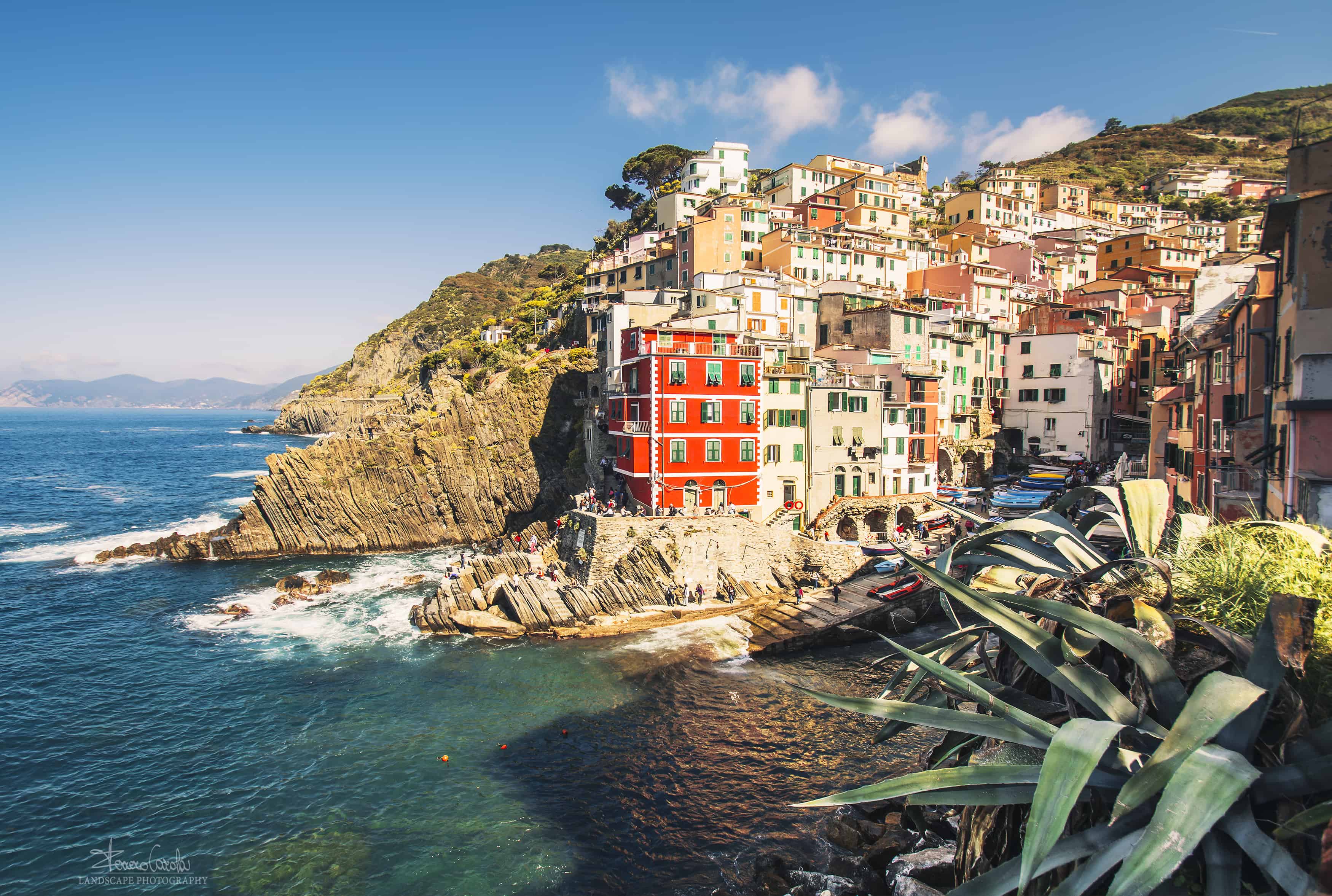 Riomaggiore is a famous village located in the Cinque Terre Park. As well as most of the Ligurian villages, Riomaggiore also consists of colorful houses overlooking the sea.  | Carola Ferrero - e-borghi Community